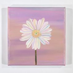 a painting of a white flower on a purple and pink background, with the center painted yellow