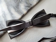 "100% Hand made bow tie Brand NEW in box. Very Rare and Unique Bow. Adjustable Strap Measurement approx. 4.5\"x 2\" inches / 11.5cm x 5 cm Perfect for wedding or any special occasion FREE US Domestic shipping" Luxury Satin Bow Tie For Formal Occasions, Classic Bow Tie For Suit Accessories As Gift, Black Bow Tie For Wedding, Elegant Bow Tie With Detachable Bow As Gift, Dapper Decorative Bow Tie As Gift, Dapper Bow Tie For Formal Father's Day, Classic Satin Bow Tie For Gift, Classic Satin Bow Tie As A Gift, Adjustable Detachable Bow Tie As Gift