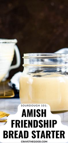 a jar filled with bread sitting on top of a table next to other food items