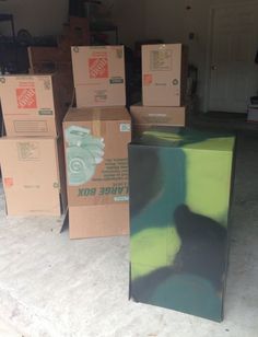 boxes are stacked up in the garage