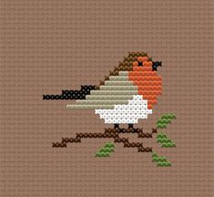 a cross stitch bird sitting on top of a tree branch in front of a brown background