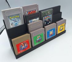 several nintendo games are stacked on top of each other