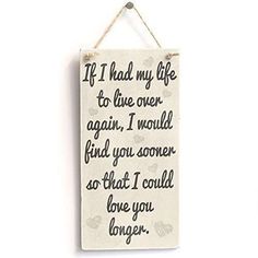 a sign hanging on the side of a wall that says if i had my life to live over again, i would find you soon so that i could love you