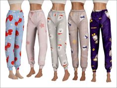 four women's pajama pants with cartoon characters on them