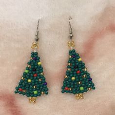 Christmas Tree Seed Beaded Handcrafted Fashion Pierced Earrings. Nwt Dangle Style Measure 2” Long By .75” Wide. With Surgical Steel French Wires. Lightweight, So Delicate Snd Pretty! Unbranded. Green Beaded Earrings With Dangling Beads For Celebrations, Green Beaded Dangling Earrings For Celebration, Green Dangling Beads Earrings For Celebration, Green Beaded Dangle Earrings For Festive Occasions, Green Beaded Dangle Earrings For Celebration, Christmas Dangle Beaded Earrings With Colorful Beads, Holiday Beaded Dangle Earrings, Christmas Colorful Beaded Dangle Earrings, Christmas Festive Beaded Dangling Earrings