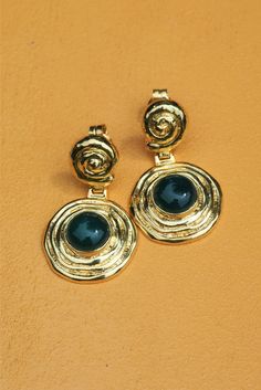 Delight in the timeless beauty of the Tethys Earring. Artfully crafted with ancient Greek details, these earrings add a unique & elegant touch to any outfit! INOOKU was established in 2016 and is based in central Athens. All INOOKU pieces are handmade, ethically and traditionally created with techniques inspired by the ancient Greeks. All pieces are handmade with attention to detail by highly skilled technicians, and through ecologically-friendly procedures.Handcrafted in fine 925 silver with 18 Malachite Stone, Ancient Greek, Athens, Timeless Beauty, How To Introduce Yourself, New Product, 925 Silver, 18k Gold, Gold Plate