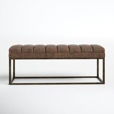 an upholstered bench is shown in front of a white background with no people