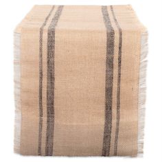 a beige and black striped table runner