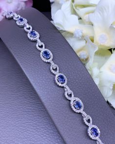 "A DREAM COMES TRUE! Gorgeous masterpiece! ONE OF A KIND Bracelet! Featuring 8 pieces of extra fine, SPARKLING CEYLON BLUE SAPPHIRES weighting a total of 5.34 carats... and 275 pieces of natural, earth-mined, SPARKLING, top-grade, F/VS, round diamonds (2.85 carat in total). SET IN ONE-OF-A-KIND 18K Solid White Gold, meticulously designed and handcrafted BRACELET!  A true heirloom piece that can transcend beyond times and eras.... BRAND NEW, HANDMADE BY OUR GOLDSMITHS! DAZZLING GENUINE CEYLON BLUE SAPPHIRE! Extremely rare, SPARKLING CORNFLOWER BLUE,  all with the SAME level of FULL TRANSPARENCY AND EXOTIC bright blue! Free length modification and free worldwide UPS/DHL Express! SAPPHIRES: 8 pieces 5.34 carats (about 0.7 carat each) Sparkling, VS clarity, CORNFLOWER BLUE, Ceylon Sapphires (t Luxury Sapphire Bracelets For Wedding, Classic Blue Diamond Bracelet For Wedding, Luxury Oval Ring Jewelry For Wedding, Luxury Oval Diamond Bracelet For Anniversary, Luxury Oval Jewelry For Wedding, Luxury Hand Set Oval Jewelry, Classic Blue Tennis Bracelet For Wedding, Luxury Hand-set Oval Jewelry, Oval Tennis Bracelet With Diamond Accents For Formal Events