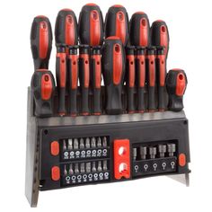 a bunch of black and red knobs are stacked on top of eachother