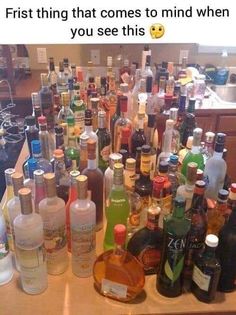 a table full of alcohol bottles with the caption first thing that comes to mind when you see this