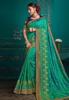 Silk Saree with blouse in Sea green colour 9704 Desc: Color : Sea Green Fabric : Silk Wash Care : Dry clean Sleeve Style : Half Sleeve Long Sleeves : Done only in Custom Stitch Sleeves Lining : Done only in Custom Stitch Bust Size : 32 to 42 Inches Occasion : Wedding Mehendi Sangeet Party Wear Reception Gudi Padwa Ugadi. With Express Free Shipping Buy Indian Party wedding wear Bridal Sarees Silk Saree with blouse in Sea green colour 9704 online in USA, UK and Canada from KollyBollyEthnics.com Semi-stitched Green Saree, Semi-stitched Green Sets With Self Design, Traditional Green Blouse For Eid, Green Semi-stitched Blouse Piece With Cutdana, Green Semi-stitched Choli With Cutdana Details, Green Semi-stitched Choli With Cutdana, Green Dupatta With Unstitched Blouse For Eid, Eid Green Blouse Piece With Dupatta, Green Semi-stitched Cutdana Choli