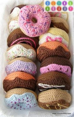 there are many crocheted donuts in the basket