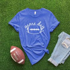 Game Day with football graphic on front of t-shirt. Graphic color varies on t-shirts. Adult Sizes S-XXL (unisex sizing)Youth Sizes S-XL (unisex sizing) For Game Day Sweatshirts click here to view.Bella + Canvas4.2 oz. Airlume combed and ring-spun cottonPre-shrunkFor a more relaxed fit, size up! Pattern Game, Camp Style, Diy Halloween Projects, Sewing Workshop, Football Outfits, Football Game, Football Games, Fashion Books, Fall Collections