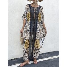 This Long Beach Cover Up Leopard Print For Women is a must-have for your summer vacation. Made from soft and lightweight chiffon/rayon fabric with a delicate print pattern all over, it is the perfect way to add a touch of style to your swimwear or summer clothing. The trendy kimono style is suitable for wearing relaxed and over your swimsuit, or as a flattering coat dress paired with casual summer clothing. This one-size cover-up fits S, M, L, and XL and features a 51.2" length, 61.4" bust, and Long Beach Cover Up, Kimono Style, Summer Clothing, Beach Covers, Rayon Fabric, Casual Summer Outfits, Kimono Fashion, Over It, Long Beach