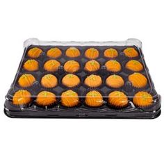 an orange cupcake in a plastic tray