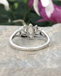 Sterling Silver Lotus Flower Ring | The Life Divine The lotus flower has been adopted by Eastern cultures as a symbol of regeneration and personal growth. Wear to remind you of the potential within. The lotus is the symbol of new beginnings and infinite potential. Sterling Silver Lotus measures approximately 3/8" H x 5/8" W “The lotus flower is a reminder of the beauty that comes from change, the magic that a new beginning brings and the seed of potential that is buried in the most unlikely plac Spiritual Sterling Silver Flower Ring, Lotus Flower Ring, The Lotus, Size 10 Rings, Flower Ring, Lotus Flower, New Beginnings, Personal Growth, Lotus