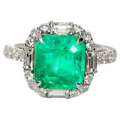 ** GRS 18K 4.37 Ct Colombia Emerald&Diamonds Engagement Ring ** GRS-Certified natural Colombia emerald with great color and fire luster weighing 4.37 ct set on the 18K white gold pave' band with FG VS baguette and round diamond weighing 1.28 ct. The beautiful Colombia emerald with great design makes the ring very attractive and can be worn on any important occasion and daily wearing. Emerald is a green-colored, highly precious stone of the Beryl mineral family. It is one of the most reputed gems Antique Emerald Engagement Ring, Vintage Emerald Engagement Ring, Vintage Cluster Ring, Emerald Set, Emerald Ring Engagement Diamond, Wedding Ring For Her, Platinum Diamond Engagement Rings, Platinum Diamond Rings, White Gold Set