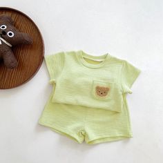 We make clothes that last. Keepsakes that can stay with your family, be handed down to your friends or donated for someone else to love. Material: 100% Cotton Colors: Beige, Green, White and Blue. Makes The Perfect Gift for Baby & Toddler Machine Washable; Imported Playful Solid Color Cotton Sets, Cute Summer Sets With Crew Neck, Family Matching Cotton Sets With Short Sleeves, Spring Cotton Crew Neck Sets, Yellow Cotton Family Matching Sets, Cotton Short Sleeve Sets For Playwear, Yellow Family Matching Cotton Sets, Summer Playtime Sets With Crew Neck, Family Matching Cotton Sets In Yellow