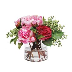 a vase filled with pink and red flowers