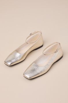 Sweet, chic, and iconic, the Vagabond Delia Gold Metallic Leather Square Toe Ankle Strap Flats are the everyday look we've been dreaming of! Textured, metallic genuine leather shapes these ballet-style flats that have a trendy square toe upper and a low-cut collar. A slender ankle strap sprouts from the heel and secures with a shiny silver buckle, all atop a contrasting black sole. Available in Euro sizes only. 0. 5" rubber heel. Cushioned insole. Rubber sole has nonskid markings. Genuine leathe Style Flats, Strap Flats, Ballet Style, Ankle Strap Flats, Ballet Fashion, Rubber Heels, Shiny Silver, Metallic Leather, Low Cut