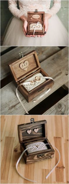 the wedding ring box is made out of wood and has lace in it, with two hearts