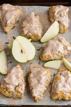 apples and biscuits on a baking sheet with icing