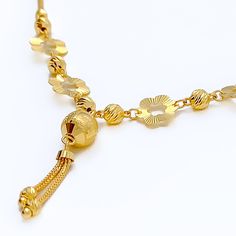 This 22k gold necklace, with a weight of 9.1 grams, showcases a charming cutwork flower design, beautifully rendered in a gleaming yellow gold finish. The necklace spans 17 inches in length, featuring a drop of 1.25 inches, and comes with 1 inch of adjustable links for a tailored fit, secured by an S lock. The intricate cutwork adds a touch of delicacy and elegance, making this piece perfect for those who appreciate the beauty of floral motifs combined with the luxurious appeal of gold. Ideal for adding a sophisticated and feminine touch to any outfit, this necklace is a testament to exquisite craftsmanship and timeless style. PRODUCT DETAILS Gold Purity(karat): 22k Gold Weight(grams): 9.1 Item Finish: Yellow Gold Necklace Length: 17" Drop Length: 1.25" Adjustable Links: 1" Links Lock Styl Traditional 22k Gold Necklace With Delicate Chain, Gold Plated Flower Shaped Necklaces, 22k Gold Necklace With Delicate Chain, Yellow Gold Flower Necklace With Adjustable Chain, Gold Flower Shaped Necklace For Formal Occasions, Traditional Yellow Gold Flower Pendant Necklace, Yellow Gold Plated Flower Shaped Necklace, Gold Plated Yellow Gold Flower Necklace, Yellow Gold Plated Flower Necklace