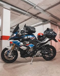 a motorcycle is parked in a parking garage