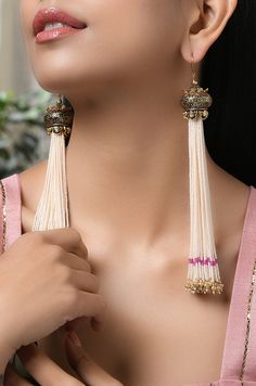 Shell Pearl Long Tassels Shoulder Duster Earrings This product has been crafted by hand and may have slight irregularities or imperfections in color or embellishment. These irregularities are the result of the human involvement in the process and add to the finished products charm while ensuring you have a one-of-a-kind piece. LENGTH Earrings Length - 10 cm Closure - Push Pin DETAILS -100% top Quality Faux Glass Polki -22K gold and silver Plated silver copper alloy. -Handcrafted in our all girls Traditional Gold Beaded Earrings With Tassels, Traditional Gold Beaded Tassel Earrings, Wedding Jewelry With Tassels, Dangle Shape, Wedding Jewelry With Tassels, Dangle Tassel Earrings For Festivals, Festival Tassel Dangle Earrings, Traditional Tassel Earrings For Party, Traditional Tassel Earrings For Festive Occasions, Traditional Tassel Drop Earrings For Party