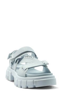 A sneaker-inspired sandal features adjustable webbing straps for the perfect fit, while an iconic lugged sole offers stability while you're out and about. 2" heel; 1 1/2" platform (size 8.5) Textile upper and lining/rubber sole Imported Spring Sport Sandals With Lug Sole, Spring Synthetic Sport Sandals With Lug Sole, Trendy Platform Sport Sandals For Streetwear, Casual Strapped Platform Sandals, Casual Synthetic Sandals With Lug Sole, Sporty Platform Sport Sandals For Streetwear, Sporty Platform Sandals For Streetwear, Spring Low-top Sport Sandals For Streetwear, Platform Open Toe Sport Sandals For Streetwear