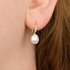 Guaranteed to add a touch of sparkle to any look, our natural diamond and Keshi pearl drop earrings are crafted from the finest 9ct yellow gold. Our baroque Keshi pearls are unique in shape and colour so every single earring will be different! These dainty gold drop earrings feature a classic hook fastening and are suitable for almost any age. A lovely Christmas gift, stocking filler or for a birthday treat for anyone born in April or June. A wonderfully thoughtful way to mark a milestone birthd Fine Jewelry Teardrop Pearl Drop Diamond Earrings, Pearl Drop Diamond Earrings Gift, Fine Jewelry Teardrop Diamond Earrings With Pearl Drop, Teardrop Pearl Drop Diamond Earrings As Gift, Teardrop Pearl Earrings Fine Jewelry, Teardrop Diamond Earrings With Pearl Drop For Gift, Teardrop Pearl Earrings With Diamond Accents, Pear-shaped Diamond Pearl Earrings For Gifts, Pear-shaped Pearl Drop Diamond Earrings