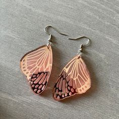 These are made from rose gold mirror acrylic. They are incredibly beautiful, but so hard to get a good picture of. 1.5in long 1in wide Available on Sterling Silver or hypoallergenic stainless steel hooks Great for sensitive ears Gold Butterfly Earrings, Outfit Pictures, Gold Mirror Acrylic, Fairy Earrings, Rose Gold Butterfly, Whimsical Accessories, Butterfly Earrings Gold, Goth Earrings, Spider Earrings