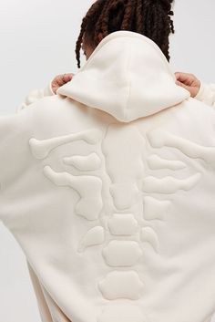 Description:Step into a bold realm of fashion with the 3D Bone Hoodie. This head-turning piece boasts wild sponge-filled 3D bone designs adorning its back, shoulders, and sleeves. Complementing the audacious motif, a delicately embroidered log... Unique Hoodie Design Ideas, Design Hoodie Ideas, Unique Hoodies Design, T Shirt Ideas Design, Embossed Hoodie, Hoodies Design Ideas, Custom Made Hoodies, Hoodie Design Ideas, Hilarious Stories