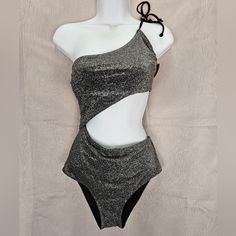 New Victoria’s Secret Pink One Shoulder Sillouete. One Shoulder Cutout One Piece Swimsuit. Black Shimmer Fabric Black. Glitter Design. Size: Medium New Never Worn. Retails: $54.95 Glamorous Stretch Swimwear For Party, Glamorous Shimmer Bodysuit For Party, Glamorous Party Bodysuit With Shimmer, Metallic Bodysuit For Summer Party, Shimmer Stretch Bodysuit For Party, Party Shimmer Stretch Bodysuit, Party Bodysuit With Shimmer And Stretch, Elegant Metallic Swimwear For Party, Glamorous Sequined Swimwear For Night Out