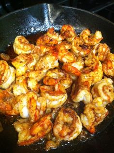 grilled shrimp with garlic and seasoning on a plate