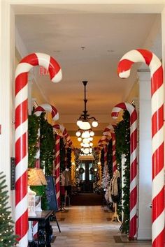 the hallway is decorated with candy canes and christmas decorations