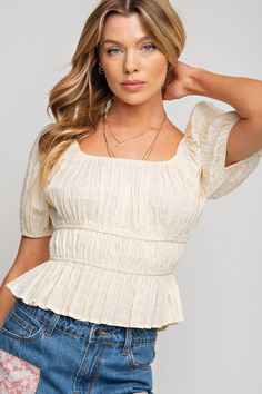 What we love about the Turn Up the Heat Ivory Peplum Top: -SQUARE NECKLINE-PUFF SLEEVES-RUCHED AND FITTED SILHOUETTE-SMALL MEASUREMENTS : LENGTH - 19.5" & BUST - 15.25" This cute little top is perfect paired with denim or your favorite shorts! Fits true to size. Chic Beige Square Neck Blouse, Square Neck Beige Tops For Fall, Fall Beige Tops With Square Neck, Beige Square Neck Tops For Fall, Fall Beige Square Neck Tops, Beige Square Neck Blouse For Spring, Beige Square Neck Blouse, Fitted Square Neck Blouse In Beige, Fitted Beige Blouse With Square Neck