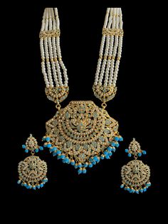 long rani haar with earrings and tika Made using Jadau pearls with turquoise beads and 22ct gold plating Traditional Turquoise Jewelry Sets For Wedding, Festive Turquoise Bridal Necklace For Wedding, Festive Turquoise Bridal Necklace, Festive Turquoise Kundan Necklace For Wedding, Wedding Turquoise Kundan Necklace, Turquoise Kundan Necklace With Meenakari For Wedding, Bollywood Style Turquoise Jewelry With Latkans, Turquoise Kundan Bridal Necklace For Wedding, Turquoise Kundan Necklace For Festivals