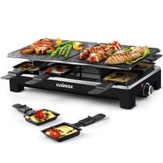 an electric griddle grill with various foods on it, including meats and vegetables