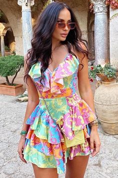 Description: This colorful printed mini is summer in a dress. Statement enough but not trend-led, floral dresses, for women with tastes, are basic for summer soirées or vacations. Featuring a plunging V neckline along with ruffles at front, adjustable spaghetti straps on the shoulders, a hidden zip closure at back, a high rise design at the waist, a swingy fit-and-flare silhouette with tiered ruffles in a short dress cut, this silky satin mini dress in our boutique is the perfect outfit for you beach holiday, or just for relaxing on the beach. Better yet, its satin fabric is polished enough that you can wear it year after year and look forward to dressing up as new every summer. Wear it on the weekend with your favorite sandals. Ruffle Dress Mini, Floral Dresses For Women, Floral Print Dress Summer, Mini Sundress, Summer Fashion Dresses, Birthday Party Dress, Floral Sundress, Suspender Dress, Mini Slip Dress