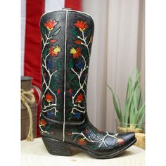 This cowboy/cowgirl boot vase/planter sculpture is made of high-quality polyresin, hand-painted, and polished individually. Foundry Select | Foundry Select Ascano Rustic Western Black Tooled Leather Cowboy Cowgirl Boot 9.5 H x 7.25 W x 3.25 D in black / blue / green / red / yellowResin | 9.5" H X 7.25" W X 3.25" D | Wayfair Planter Sculpture, Boot Decor, Boot Vase, Designer Bedroom, Unique Boots, Country Style Outfits, Rose Vines, Cowgirl Boot, Leather Mask