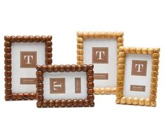 three wooden frames with the letter t on them