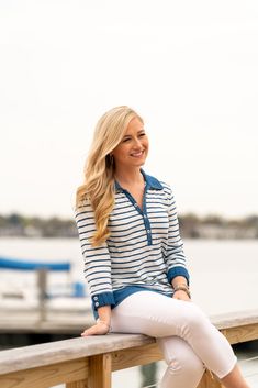 Inspired by the uniform of the French Navy, our super soft cotton striped shirt is the BEYC adaptation of a maritime classic. Our version of the iconic Breton shirt has three-quarter sleeves, Bitter End buttons at the turned-up cuffs, and a wide contrasting navy waistband for feminine flair. Set a course in this classic, sailor style. Breton Shirt, Grandma Chic, Sailor Style, Sailor Fashion, Coastal Grandma, Vintage Patches, French Navy, Womens Jersey, Jersey Shirt