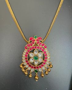 Jadau Kundan pendant with gold-finished chain. Brass based pendants and hand made. Festive Yellow Gold Kundan Pendant Necklace, Gold Temple Necklace With Pearl Pendant, Yellow Gold Kundan Pendant Necklace For Celebrations, Gold Temple Necklace With Pearl Pendant For Festive Occasions, Gold Temple Necklace With Pearl Pendant For Festivities, Gold Necklace With Detachable Square Pendant, Traditional Gold Chain Jewelry For Wedding, Gold Fusion Temple Necklace For Celebration, Gold Pendant Kundan Necklace For Celebration