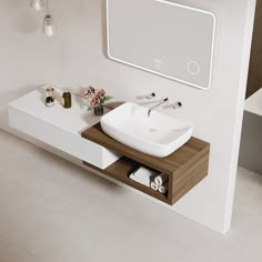 a white sink sitting on top of a wooden counter