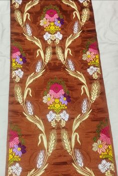 It is butiful jacquard  minakri tibetan brocade fabric and gold zari woven work and weaving by Handloom Warp _ art silk Weft - art Silk Extra weft- Zari (Gold And Silver) Width-23 Inch  Length - eight meters Brown Traditional Wear With Motifs For Festivals, Traditional Brown Dupatta With Weaving Work, Brocade Dupatta With Weaving Work, Brocade Traditional Wear With Weaving Work, Traditional Brocade Wear With Weaving Work, Festive Brocade Traditional Wear With Weaving Work, Multicolor Folk Traditional Wear With Pallu, Multicolor Brocade Traditional Wear For Festivals, Festival Brocade Dupatta With Weaving Work