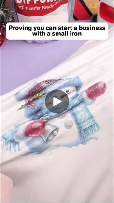 someone is painting a t - shirt with a snowman on it and the caption reads, providing you can start a business with a small iron