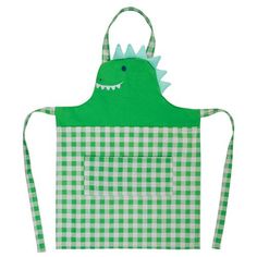 a green and white apron with a dinosaur head on it's back, in front of a white background