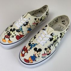 Vans x Disney Authentic Sneakers featuring "Mickey's Birthday" from the 2018 Limited Edition collection. Screen-printed Mickey characters on canvas upper, white sidewalls and signature rubber waffle outsole. MTL # VN0A38EMUJ2 Men's Size 9 Condition:  These sneakers are salesman samples as indicated on the inside of the shoe tongue and do not have a retail box. Good condition, unworn.  Canvas is slightly out of shape around the shoe collars from storage.  Please see all photos. This item is eligible for Authenticity Guarantee. Vans Custom Sporty Sneakers For Skateboarding, Harry Potter Vans Custom, Vans Spongebob, Disney Vans Painted, Vans Disney, Vans Art Shoes Disney, Disney Vans, Retail Box, Mickey Birthday